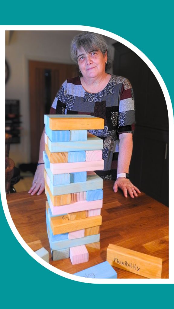 Debbie Walton of Mindful Growth Solutions.  Registered Mental Health Nurse with a game of Jenga highlighting emotional words