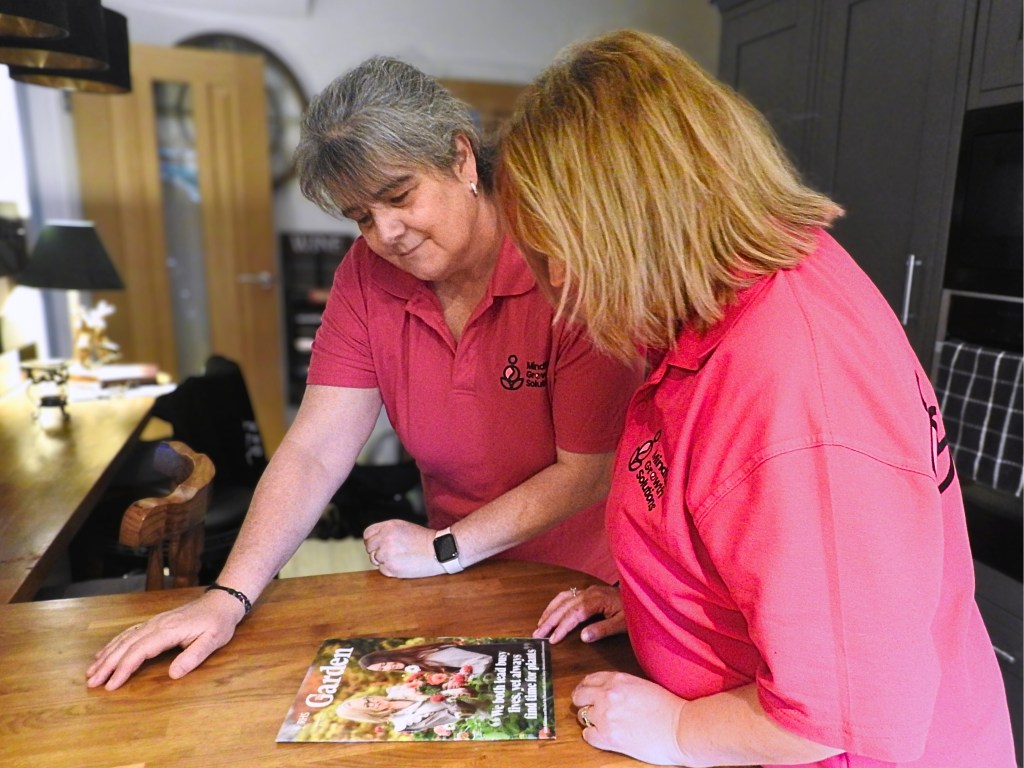 Angela and Debbie looking at relaxation activities to help mental health